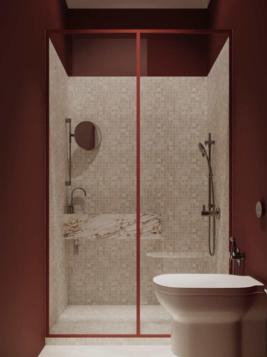 Rich, burgundy walls frame a walk-in shower with marble details, offering a spa-like retreat.